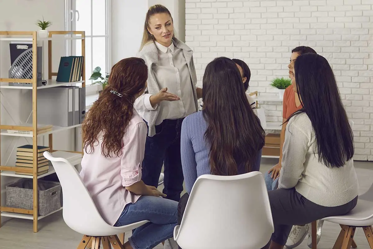 women discuss where to find a women's treatment center