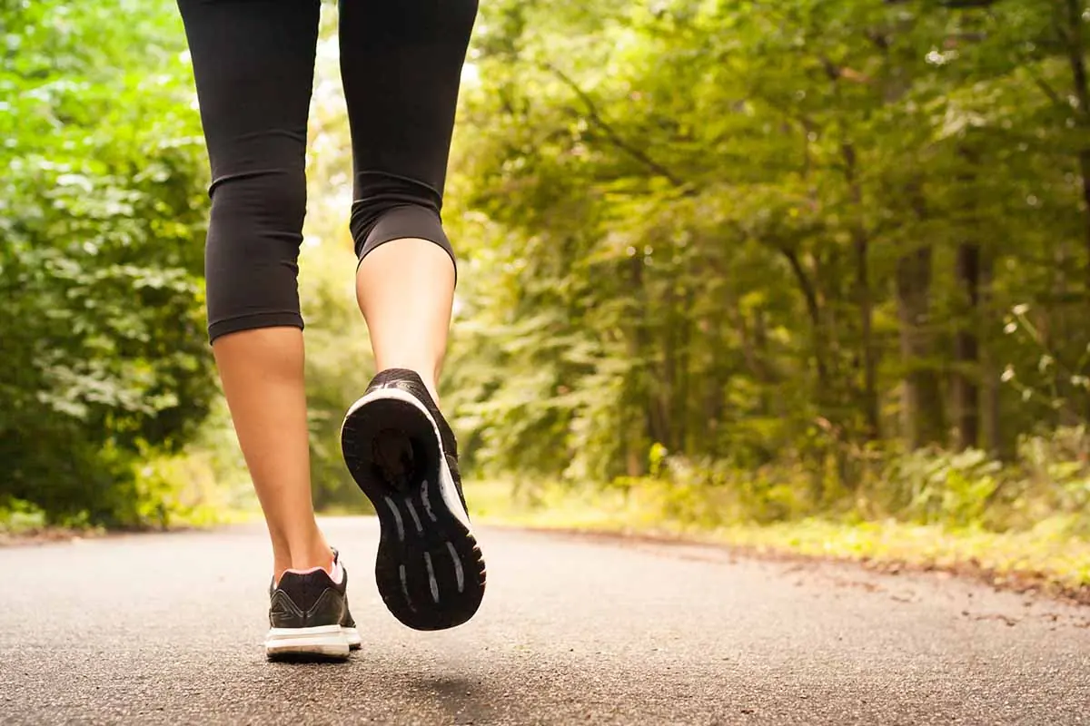 a woman incorporates running into her self care routine