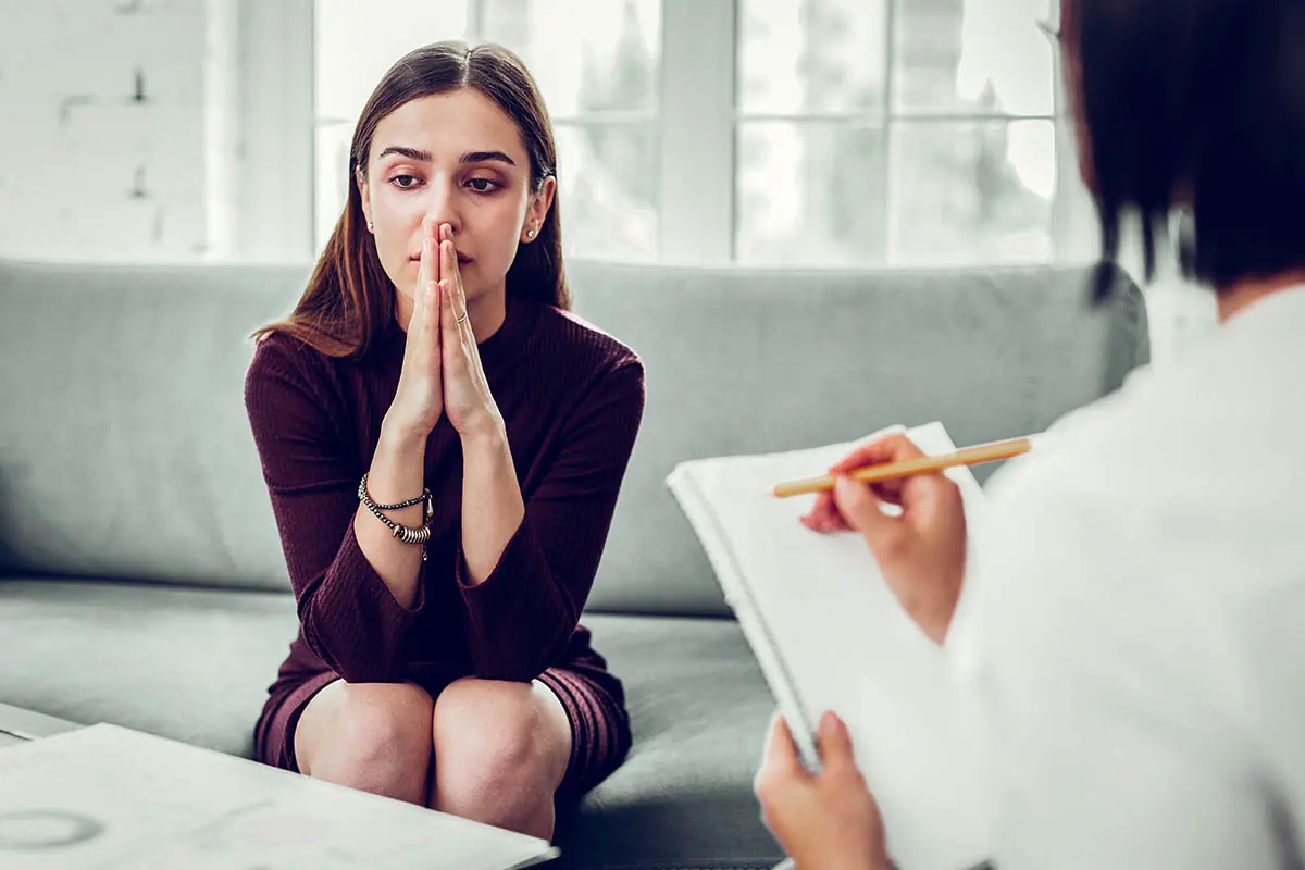 a woman works through issues in trauma treatment