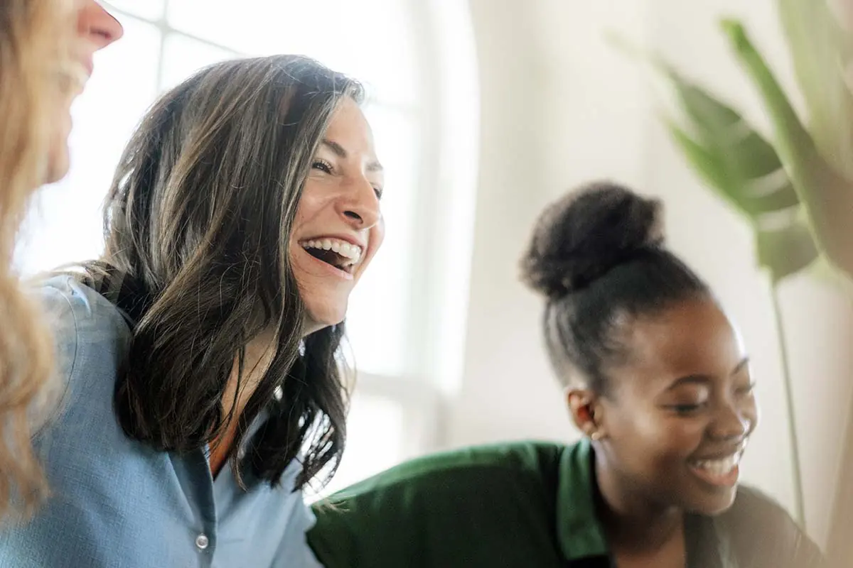 two woman are happy with their proven drug and alcohol treatment