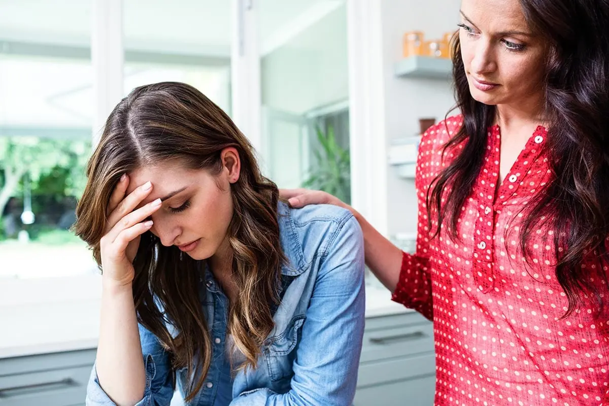 a woman dealing with heroin overdose symptoms