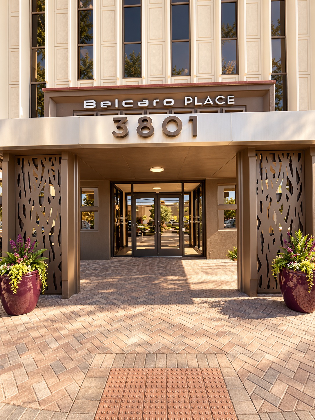 Entrance to the Belcaro Place building with the number 3801 above the doors
