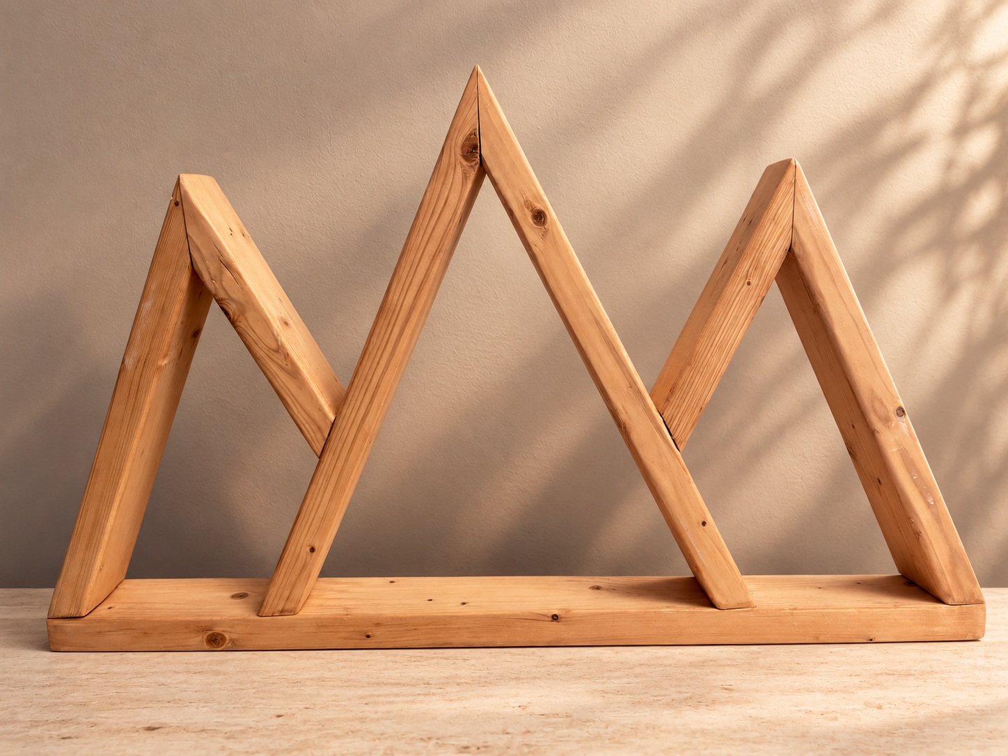 Wood angular frame forming three peaks