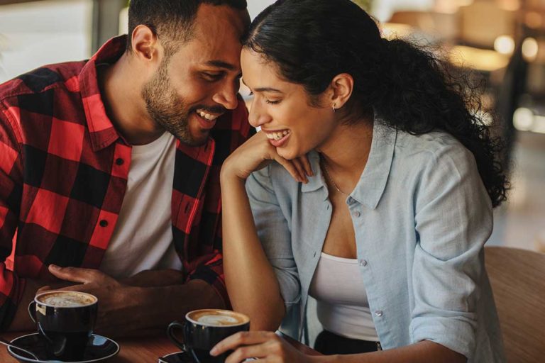 Dating-And-Sober-How-Courtship-Changes-And-Improves-In-Recovery a couple smiles while dating and sober