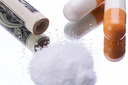 illegal pharmaceutical pills and drugs money on mirror drugs and pills