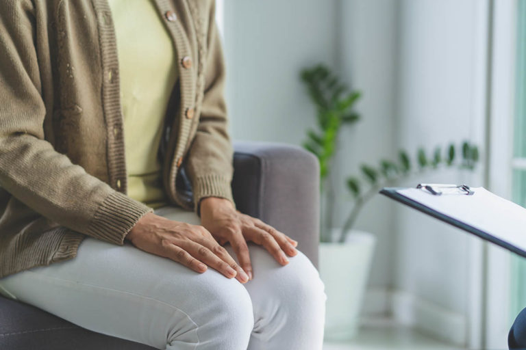 a woman learns what to look for in a local rehab center