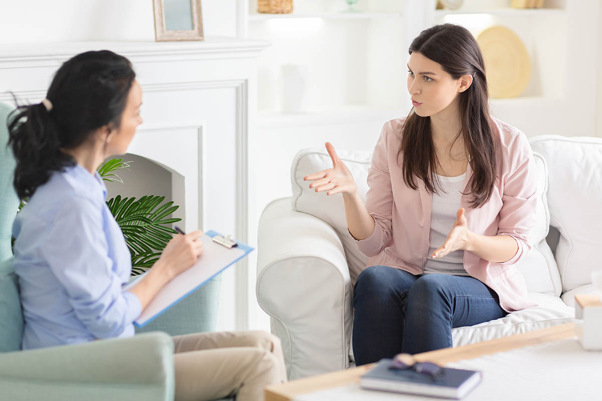 a woman learns about eating disorder treatment