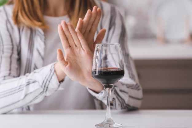 Benefits of Avoiding Peer Pressure for Sobriety a woman deals with peer pressure and sobriety
