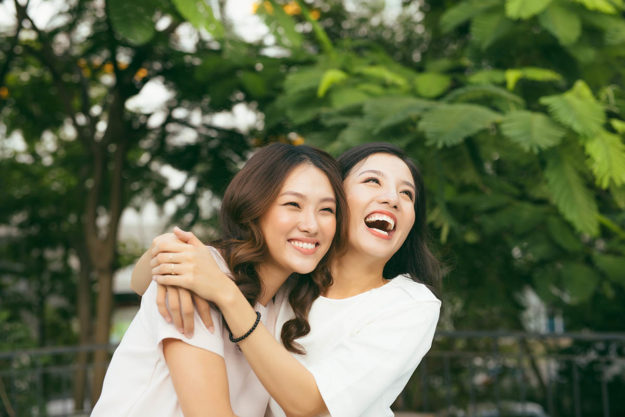 September Is National Recovery Month two women are happy to celebrate national recovery month