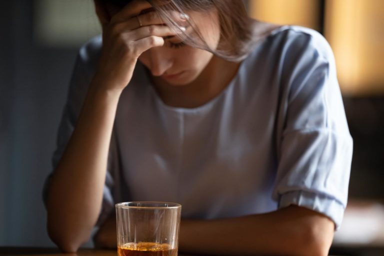 Signs of Alcohol Abuse in the Workplace a woman copes with alcohol abuse in the workplace