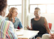 women in a group setting discuss the benefits of gender-specific addiction treatment for women in colorado